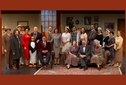 Cast of “The Man Who Came to Dinner” featuring a wheelchair, penguins, and quirky objects on a red background