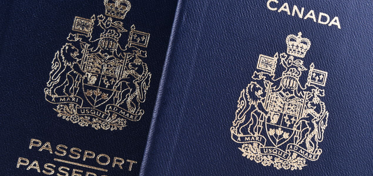 Close up of the cover of two Canadian passports.