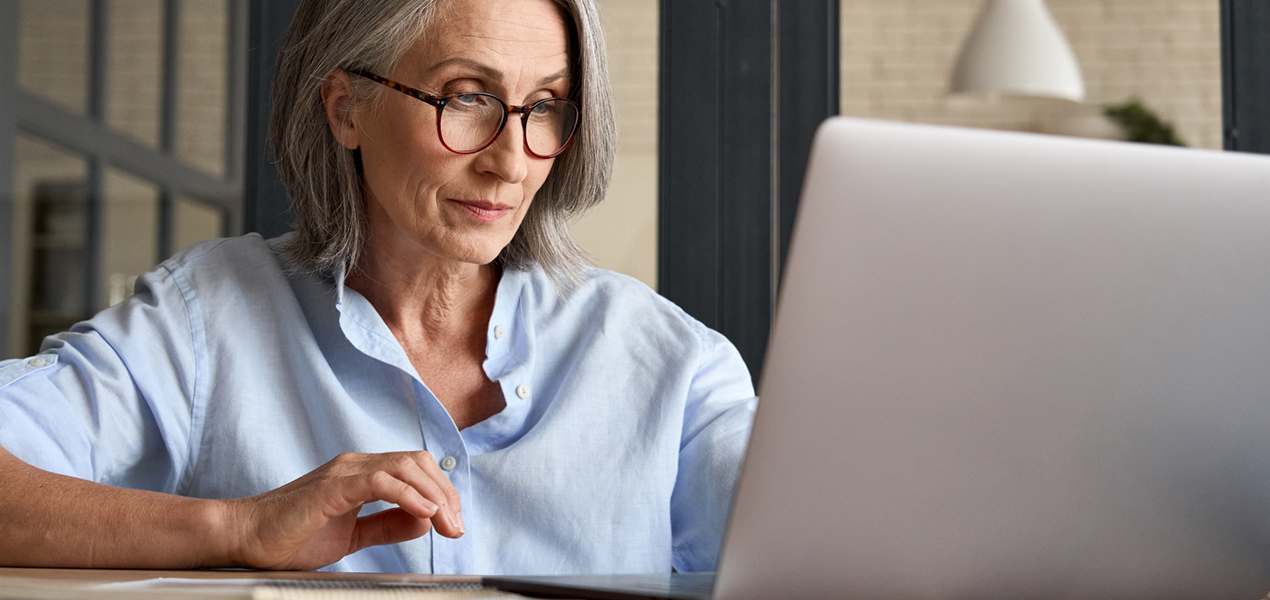 Mature woman working laptop