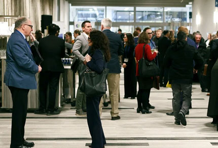 A group of MBA members at a conference.